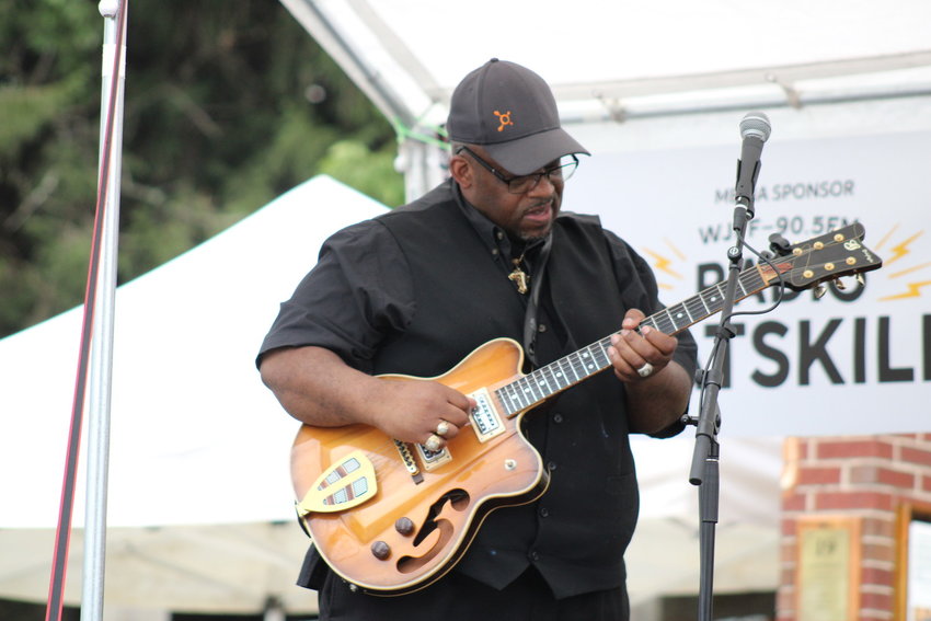 Slam Allen shows off his incredible skills with a six-string at last year's Riverfest. The festival is sponsored by the Delaware Valley Arts Alliance.